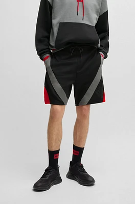 HUGO x RB oversize-fit shorts with signature bull motif
