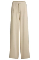 Wide-leg tracksuit bottoms with pleat details