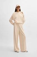 Wide-leg tracksuit bottoms with pleat details