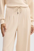 Wide-leg tracksuit bottoms with pleat details