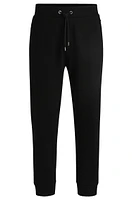 BOSS - Mercerized-cotton tracksuit bottoms with stripe waistband Black