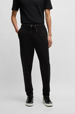 BOSS - Mercerized-cotton tracksuit bottoms with stripe waistband Black