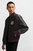 BOSS x Creation of the Gods varsity jacket with embroidery