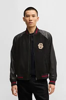 BOSS x Creation of the Gods varsity jacket with embroidery