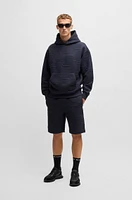 Relaxed-fit hoodie with hexagonal quilting