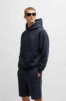 Relaxed-fit hoodie with hexagonal quilting