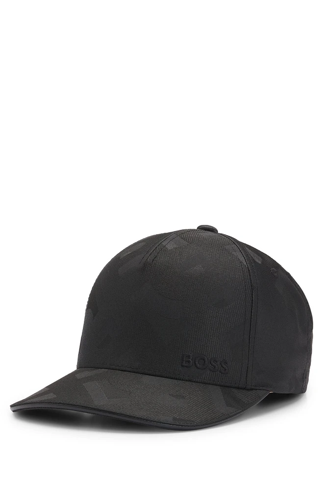 Monogram-pattern cap with embroidered logo