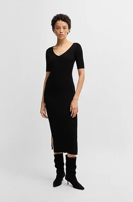 Knitted dress with V neckline stretch yarns