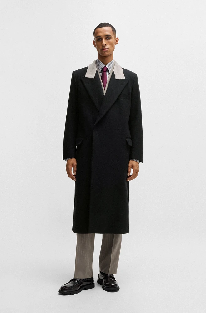 Wool coat with peak lapels