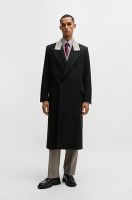 Wool coat with peak lapels