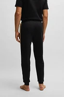 Cotton-terry tracksuit bottoms with contrast side panels