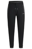 Tracksuit bottoms with contrast piping