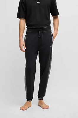 Tracksuit bottoms with contrast piping