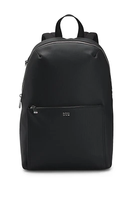 Textured backpack with logo hardware