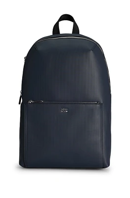 Textured backpack with logo hardware