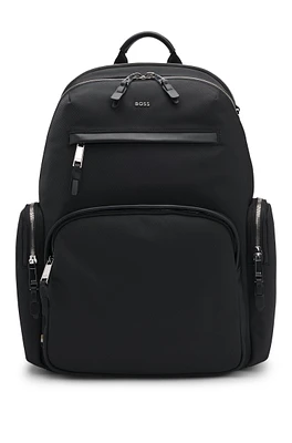 Backpack with leather trims and two-way zip