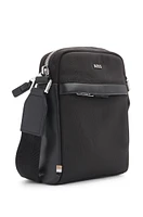 Reporter bag with logo lettering and detachable strap