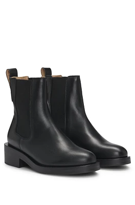 Leather Chelsea boots with logo rivet