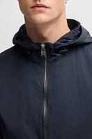 Water-repellent jacket crinkle fabric with adjustable hood