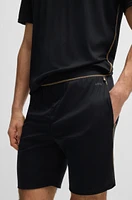 Stretch-jersey pajamas with overlock stitching