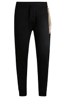 Cotton-terry tracksuit bottoms with stripe print