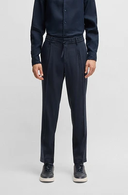 Tapered-fit trousers a linen blend