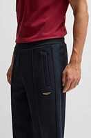 BOSS x ASTON MARTIN jersey tracksuit bottoms with perforated leather stripe