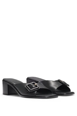 Leather mules with buckle detail