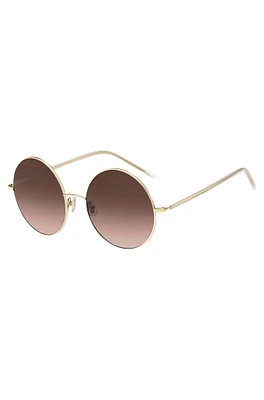 Round sunglasses in gold-tone titanium