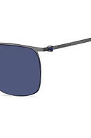 Steel sunglasses with blue lenses and sleeves