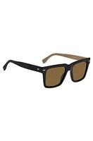 Black bio-acetate sunglasses with large temple logo