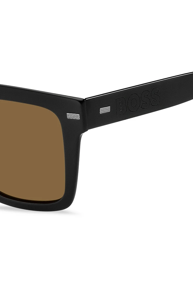 Black bio-acetate sunglasses with large temple logo