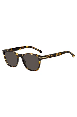 Tortoiseshell-acetate sunglasses with signature hardware