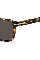 Tortoiseshell-acetate sunglasses with signature hardware