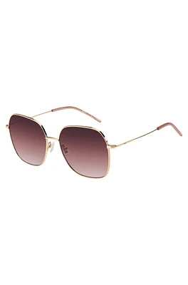 Gold-tone sunglasses with pink details