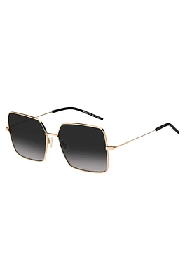 Gold-tone sunglasses with black end-tips