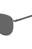 Steel and beta-titanium sunglasses with black end-tips