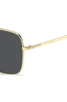 Gold-tone sunglasses with signature hardware