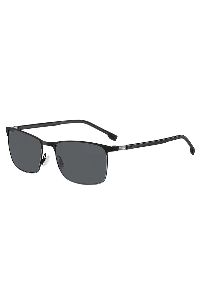 Italian-made sunglasses in steel with stripe detail