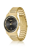 Black-dial watch with gold-tone link bracelet