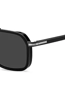 Double-bridge sunglasses in layered black acetate