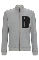 Equestrian second-layer cardigan with zipped chest pocket