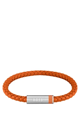 Orange braided-leather cuff with magnetic logo closure