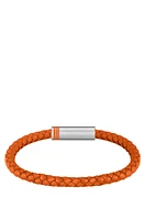 Orange braided-leather cuff with magnetic logo closure