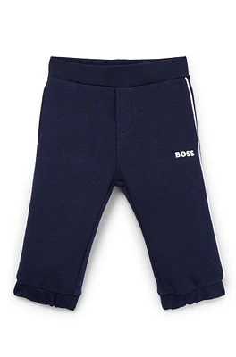 Kids' tracksuit bottoms with logo print