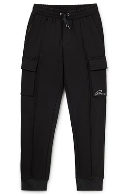 Kids' tracksuit bottoms with cargo pockets