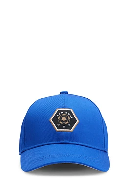 Kids' cap with logo badge