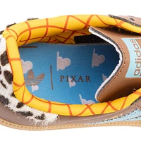 Chaussure athlétique adidas Disney Pixar Toy Story Samba OG Woody - Enfants Brune / Bleue
