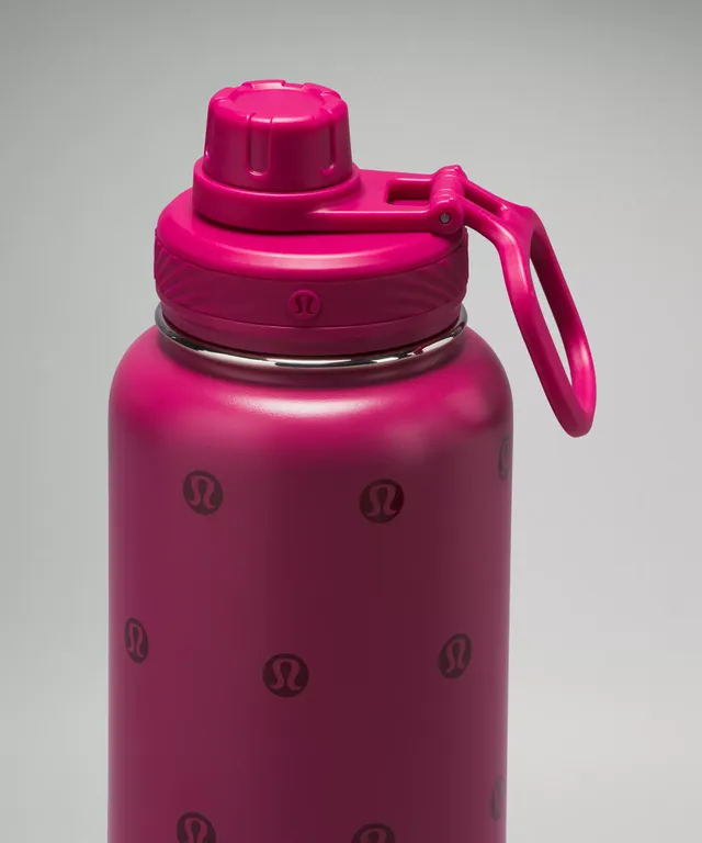 Lululemon water bottle. Pink with silver writing. - Depop