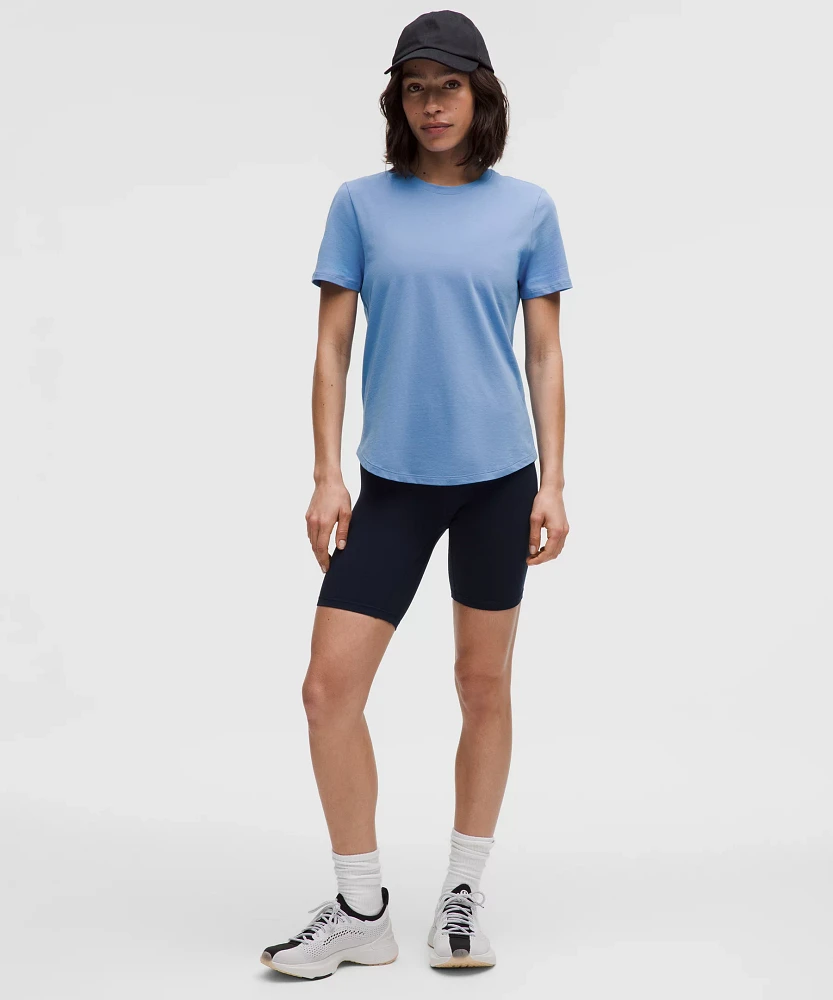 Love Curved-Hem Crewneck T-Shirt | Women's Short Sleeve Shirts & Tee's